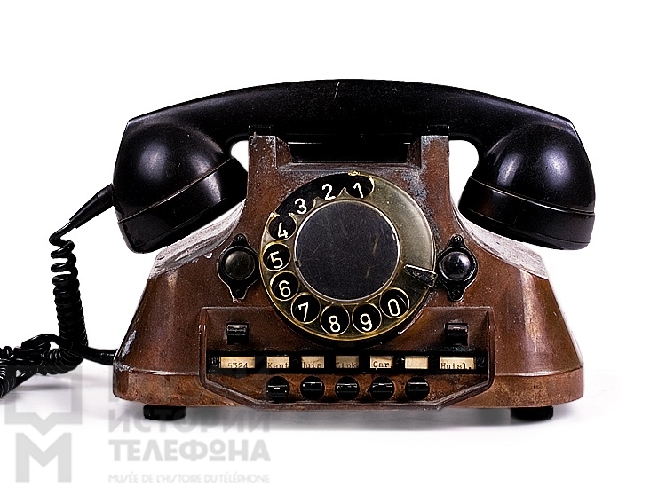 Телефонный аппарат-коммутатор системы АТС для двух внутренних линий и 7 номеров в литом металлическом корпусе System 600